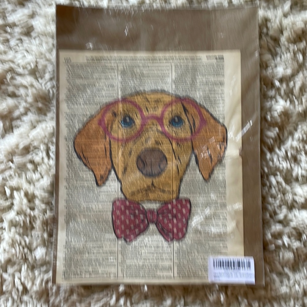 Vintage dictionary page with dog.